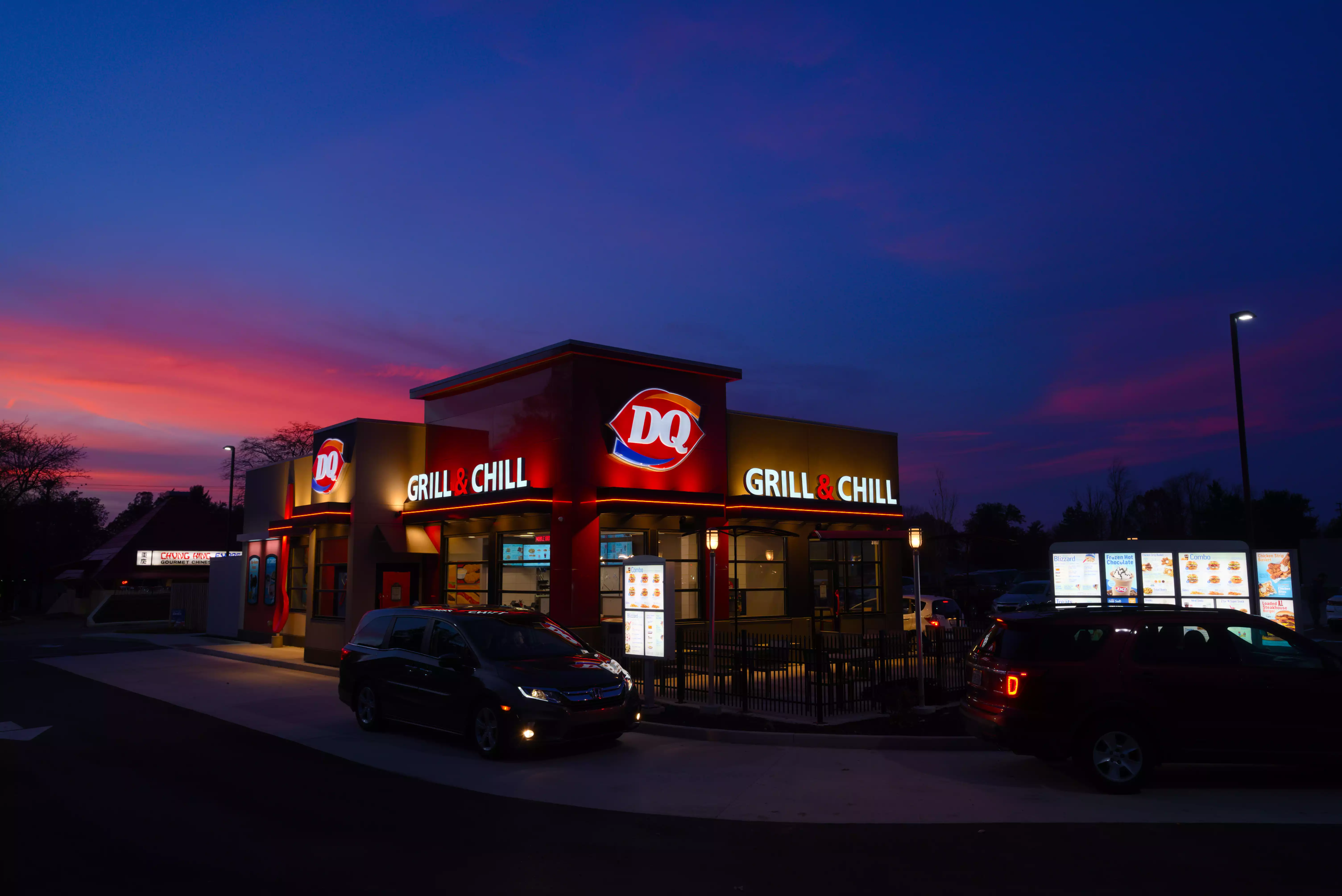 North Anthony Dairy Queen, twilight, east view, with cars in drive-thru"